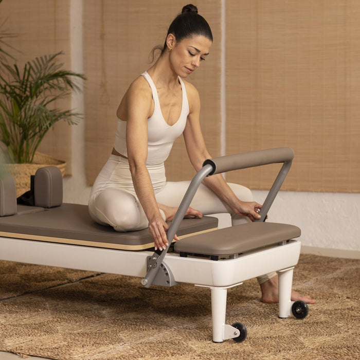 Nubium™ Reformer – kompakt og støjsvag pilatesmaskine i aluminium